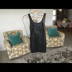 Black leather and knit form fitting dress